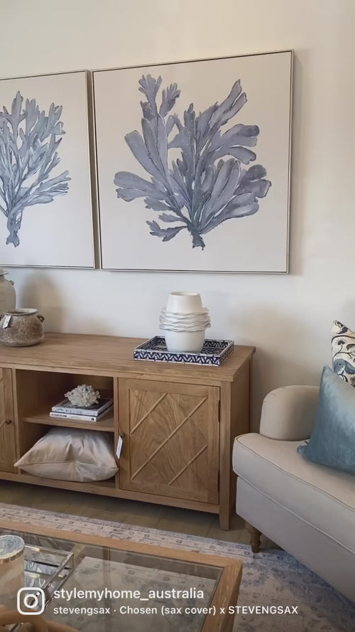 Video of hand painted blue coral artwork in living room